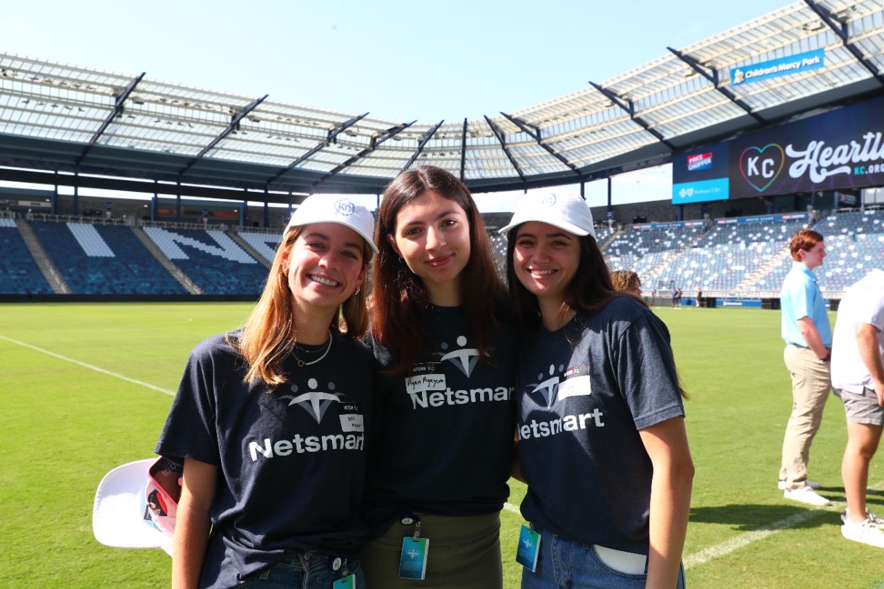 Interns standing together at Children's Mercy Park